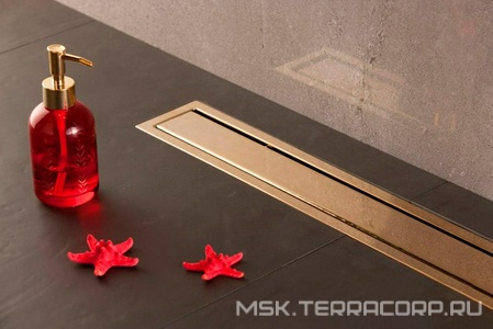 Дренажный канал 650хh71/117мм,готов компл,сифон d50 выход вбок 48л/мин,ножки, 2х сторон.решётка/полая под плитку(цв.золото 24К глянец)Prem Gold LineZZ Pestan Premium Gold Line 13100053